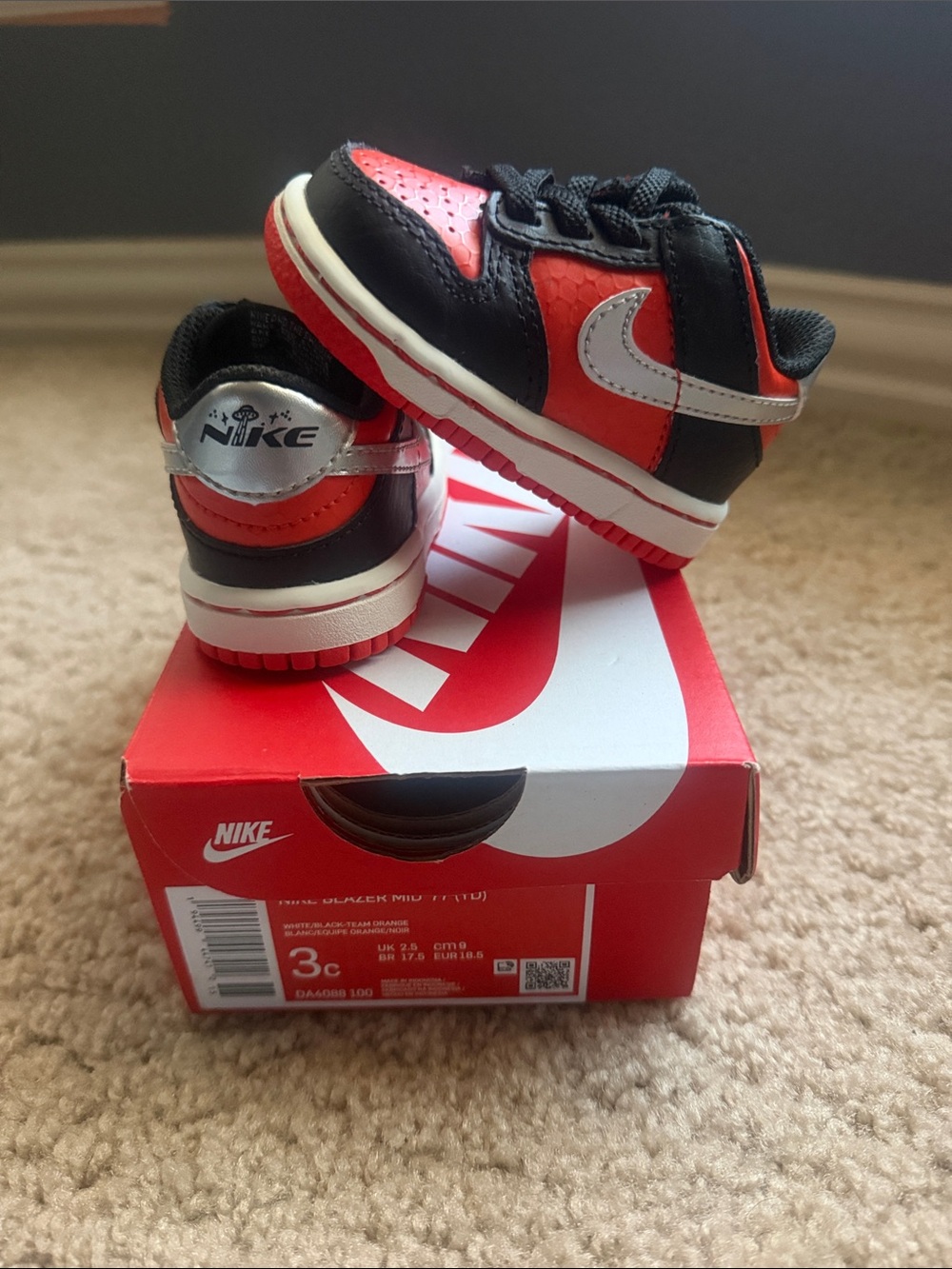 Baby Nike Blazer Mid ‘77 Orange and Black Low-Top Sneakers